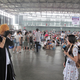 Illustration for article titled Geeks, Games, and Extremely Bored Booth Companions at China Joy 2013